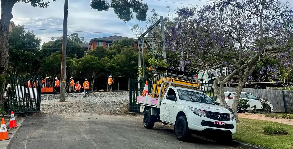 A Crown ute controlling the gate at a construction site